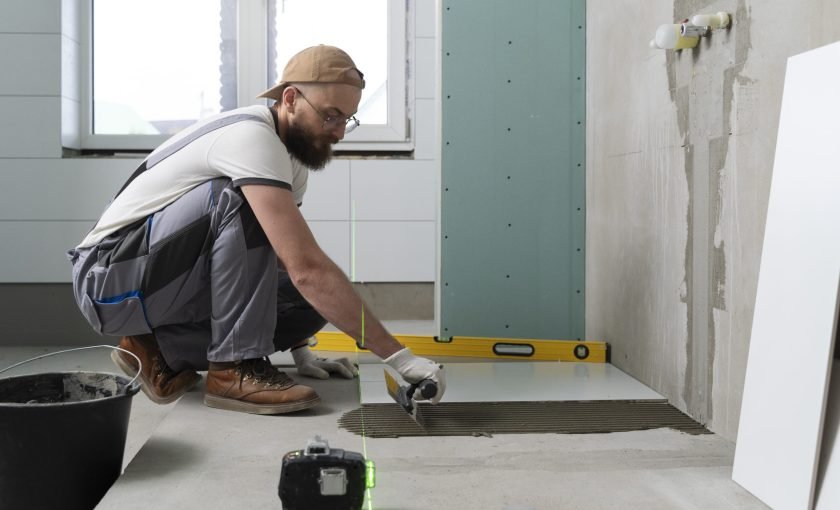 tiler-working-renovation-apartment tiler-working-renovation-apartment